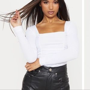 PLT white ruched long sleeve body suit